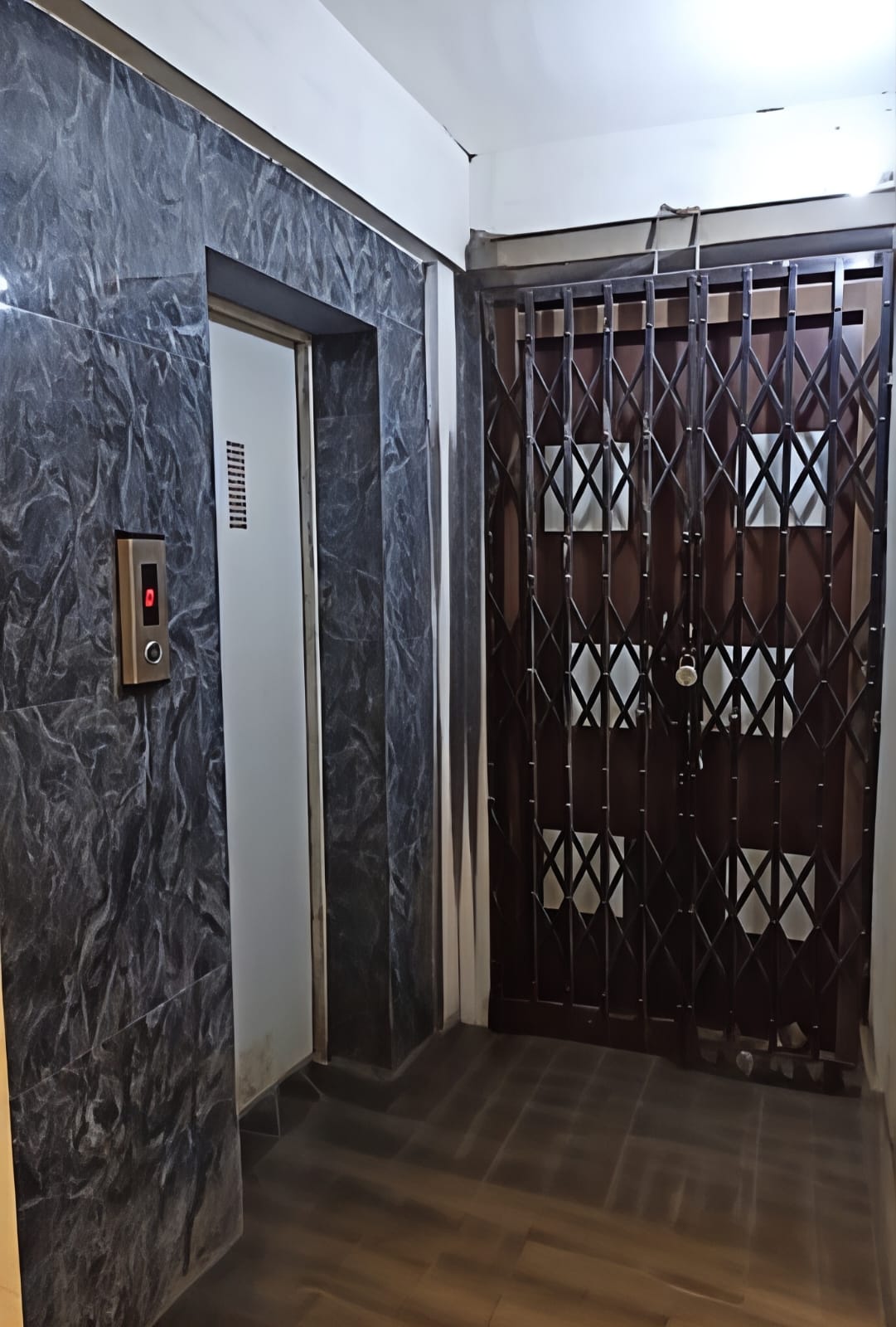 Secure entrance and lift lobby at Saba Guest House near Park Street Kolkata photo 71