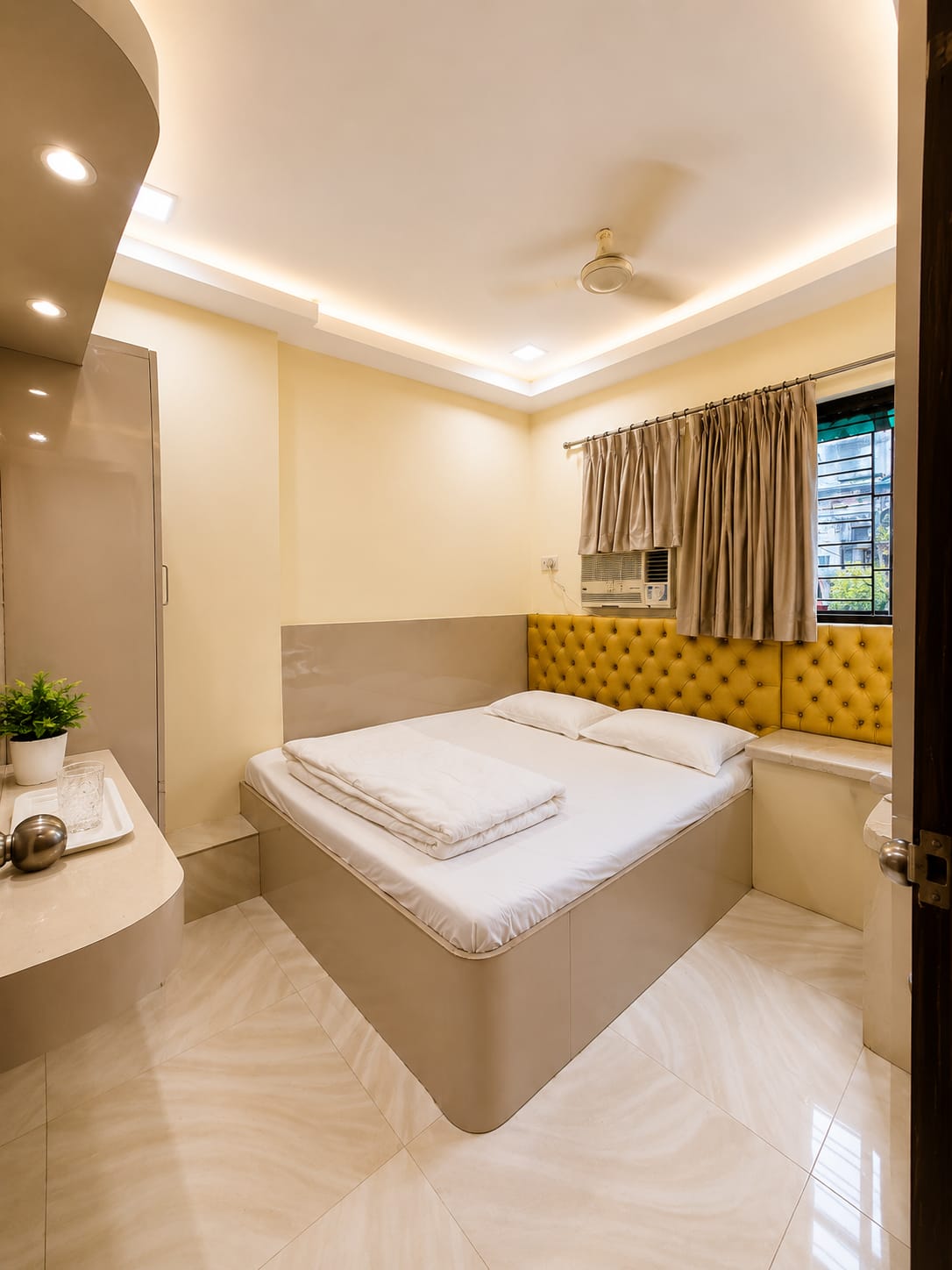 SANA room with seating and fridge area